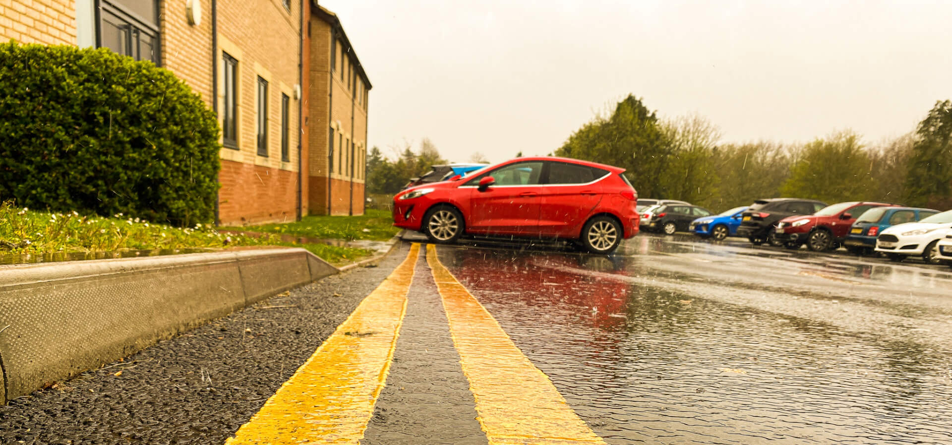 Car park, red car